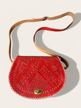Red Embossed Leather Saddle Crossbody Bag